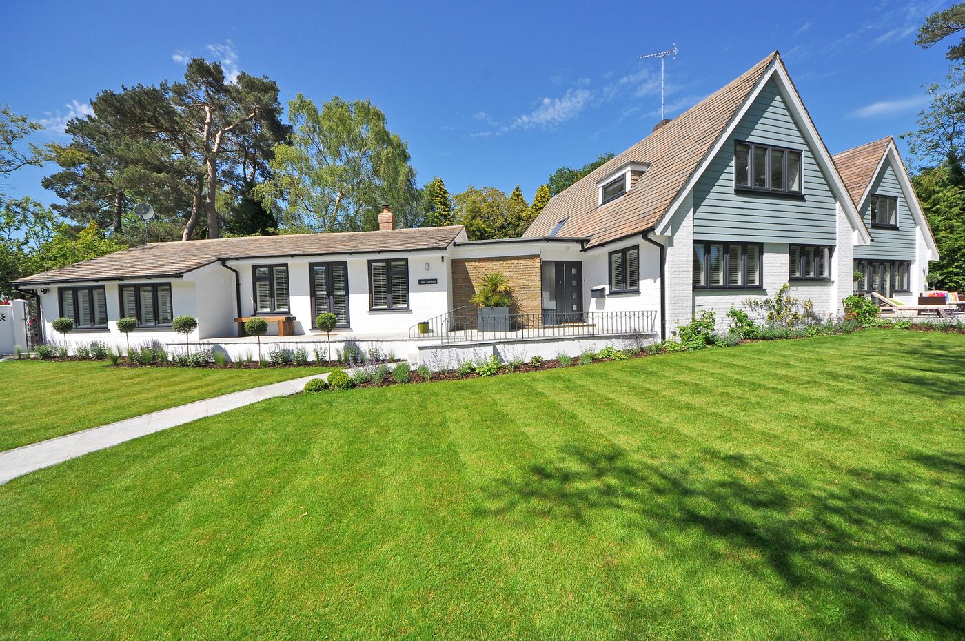 Home exterior with refreshed trim and yard
